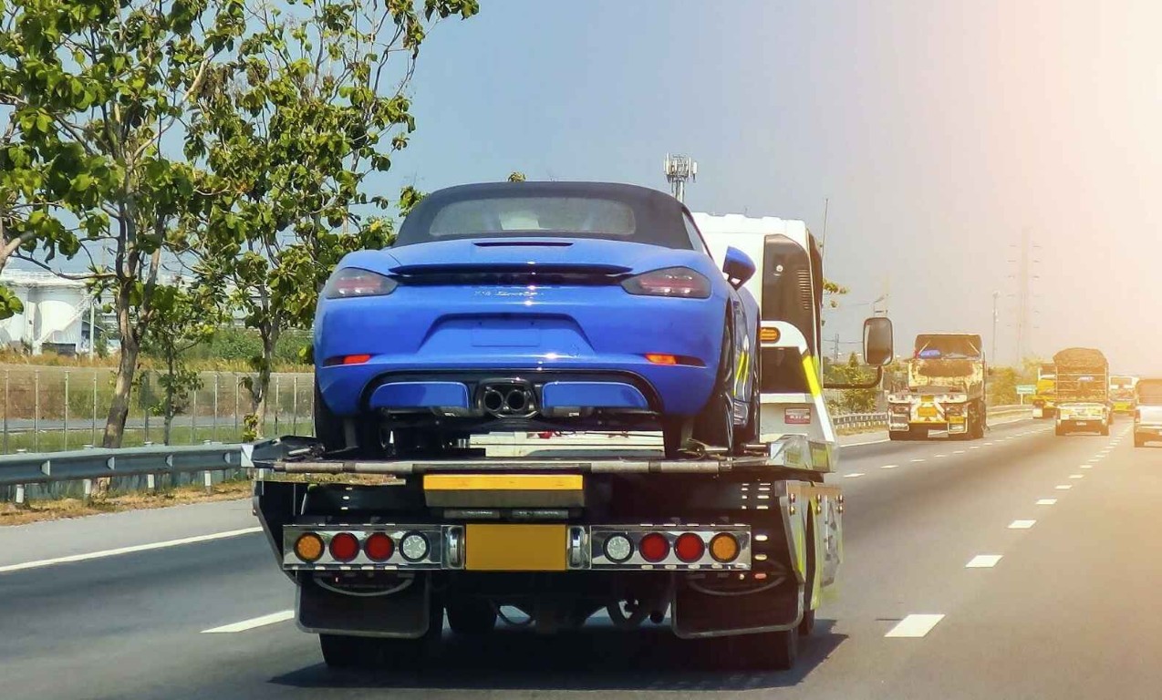 Long-distance towing service transporting vehicles across California
